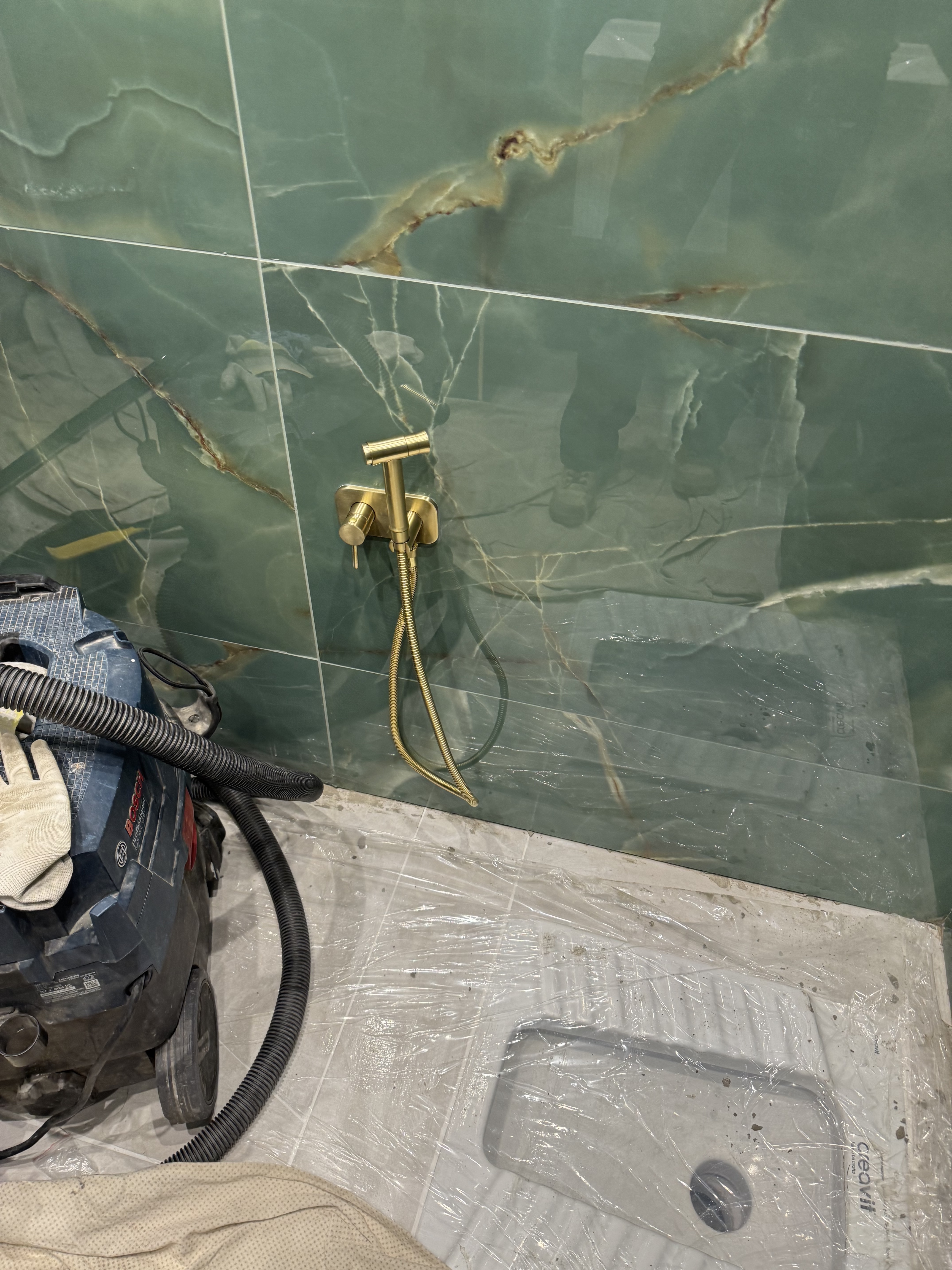 Before green marble bathroom renovation